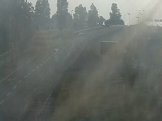 Webcam à proximité de l'A43 à Bron à la jonction entre le Boulevard de l'Université et la rue A.Bouloche. Vue orientée vers la Porte des Alpes